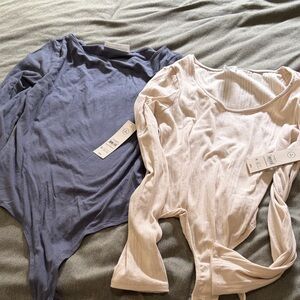 2 no boundaries long sleeve body suites